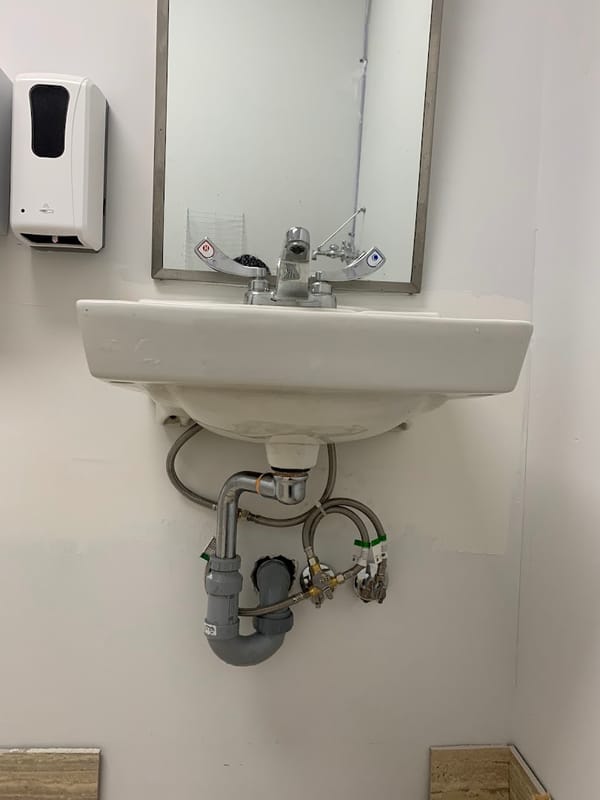 Commercial washroom sink hookup