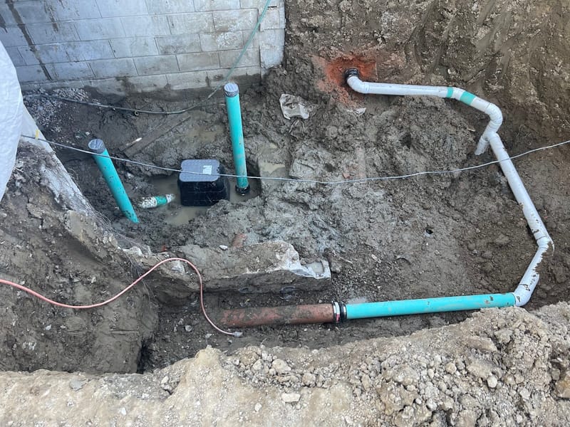 Excavated underground sewer line replacement